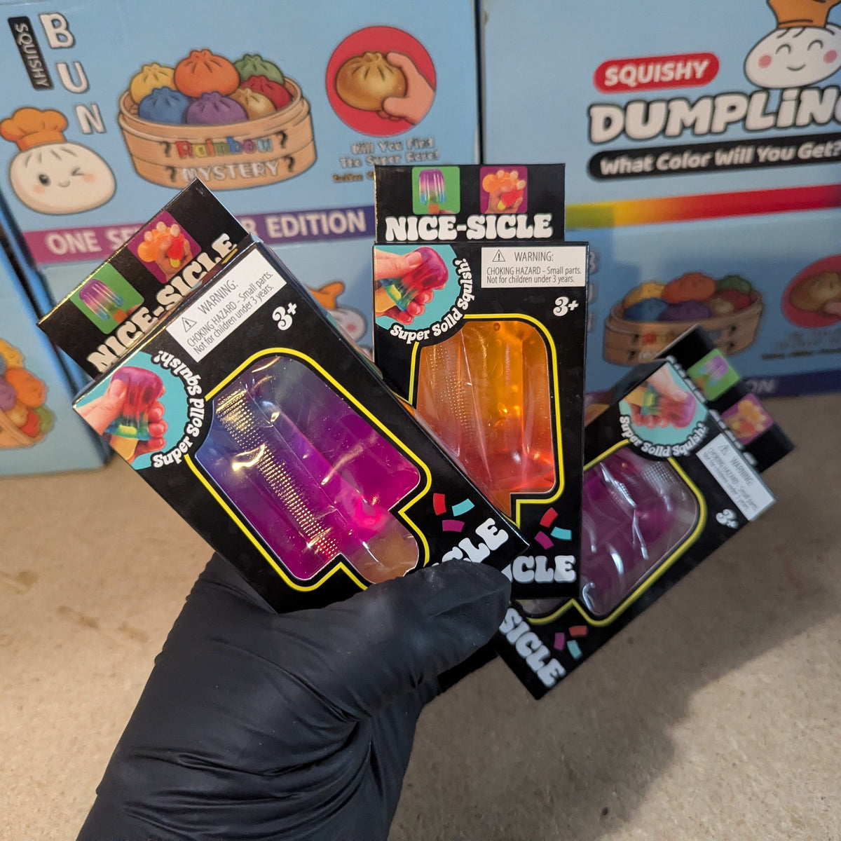 Set of three holiday popsicle-shaped gelatin squish toys