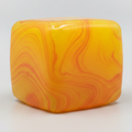 Yellow and orange swirl squeeze cube squishy toy